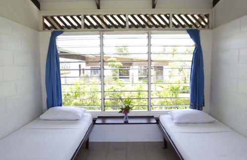 Madang Hotel | Discover Madang Lodge Hotel: Pool, Spa & Family Fun Awaits
