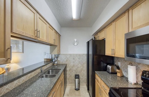 Madeira Beach Condo | Relax at Madeira Beach Yacht Club 247F with Pool Views