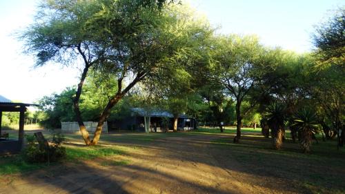 Ramotshere Moiloa Ski Chalet | Explore Madikwena Crocodile and Game Farm – Pet Friendly Retreat