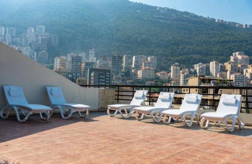 Jounieh Hotel | Discover Madisson Hotel: Family-Friendly with Pool & Hot Tub