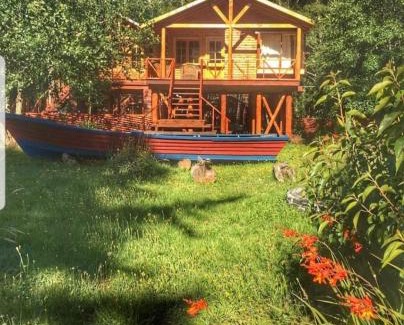 Ancud Cabin | Discover Mae Joa Turismo: Family Cabanas & Camping Bliss