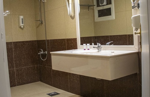 Salmiya Hotel | Discover Magic Suite Hotel: Family-Friendly & Accessible Stay