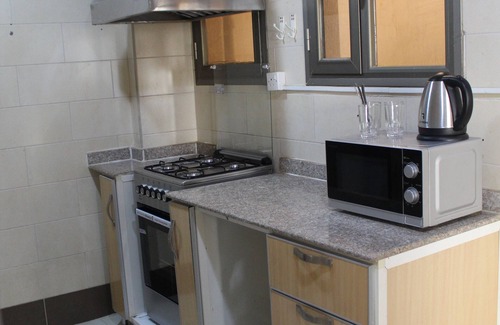 Mangaf Hotel | Budget-Friendly Magic Suite Mahboula - Family Friendly
