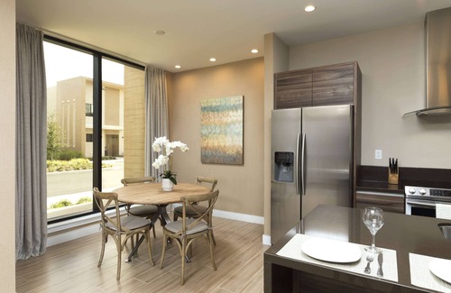 Reunion Hotel | Relax at Magic Village Views with Pool & Spa Amenities