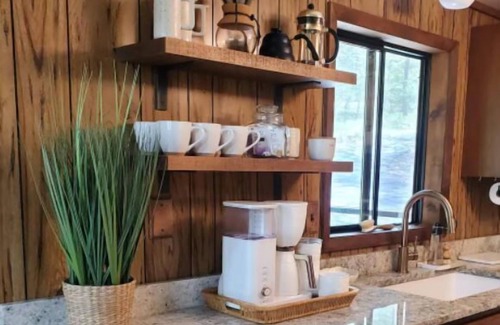 Pocono Pines Cabin | Riverfront Retreat: Cozy Cabin with Spa & Pet-Friendly Amenities