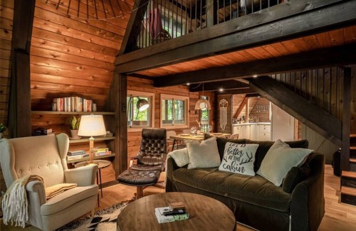 Huntsville Cabin | Exceptional A-Frame Treehouse with Hot Tub & Fireplace