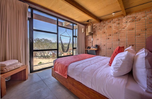San Antonio de las Minas Hotel | Relax at Maglen Resort: Pet-Friendly Oasis with Ocean Views