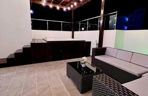 Santiago Province Apartment | Elegant Penthouse Retreat with Jacuzzi & Pool Access