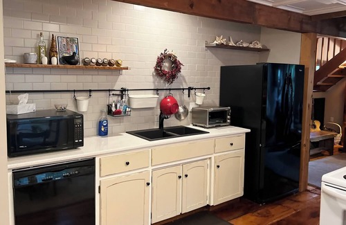 Exhibition Park House | Unforgettable 1867 Coach House with Private Patio Near Downtown