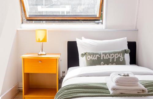 Camden Town with Primrose Hill Apartment | Elegant 3BR Apartment with Balcony and Child-Friendly Amenities