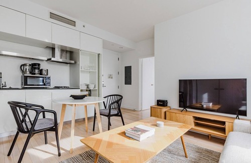 Central New York City Apartment | Magnificent Midtown 1BR w/Gym, Rooftop, A/C & W/D, by Blueground