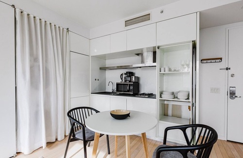 Central New York City Apartment | Magnificent Midtown 1BR w/Gym, Rooftop, A/C & W/D, by Blueground