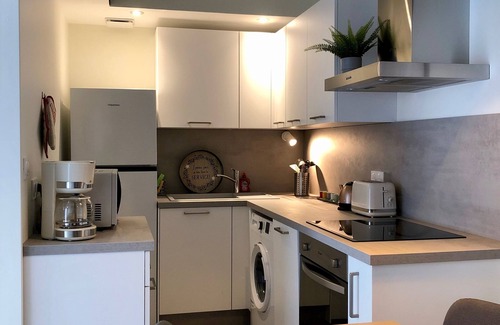 Saint-Priest Apartment | Elegant T2 Duplex with Covered Terrace & Family Amenities