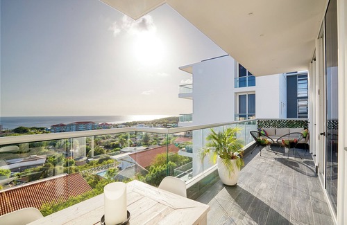 Piscadera Apartment | Elegant Ocean View Condo with Pool, Spa & Gym Access