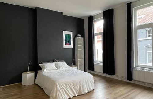 Postel Apartment | Elegant Duplex at Place Flagey - Perfect for Families