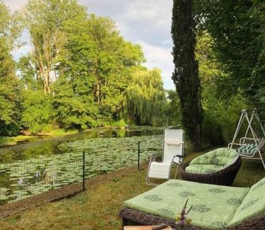 Annay-sur-Serein Villa | Relaxing Stay at Magnifique Moulin with Hot Tub & River Access