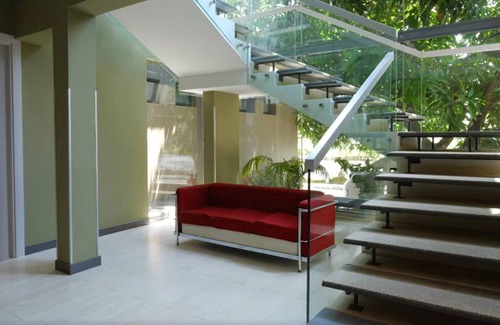 Malabo Hotel | Discover Magno Suites: Family-Friendly Retreat with Spa