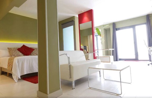 Malabo Hotel | Discover Magno Suites: Family-Friendly Retreat with Spa