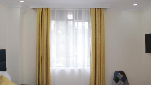Kericho Hotel | Discover Magnolia Suites: Pet-Friendly & Family Comfort