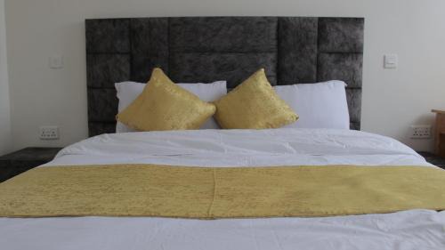 Kericho Hotel | Discover Magnolia Suites: Pet-Friendly & Family Comfort