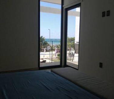 Mahahual Apartment | Beachfront Mahaguay - 2-Bedroom Retreat with Pool