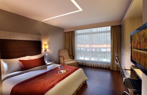 Vaishali Hotel | Comfortable Stay at Mahagun Sarovar Portico Suites
