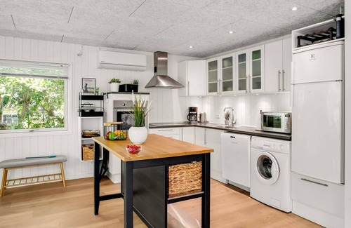 Rindby Strand House | Relax at Maik: Oceanfront Getaway with Spa & Hot Tub