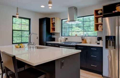 Charlotte House | Modern Main House: Comfort with Kitchen & Spa Amenities
