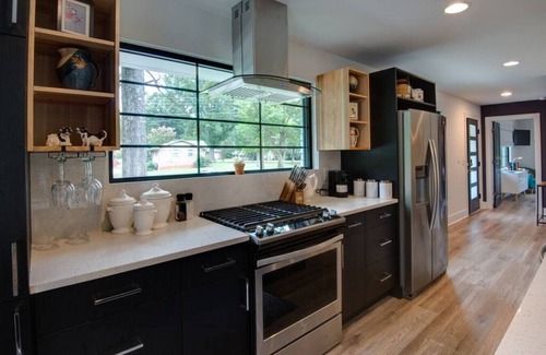 Charlotte House | Modern Main House: Comfort with Kitchen & Spa Amenities