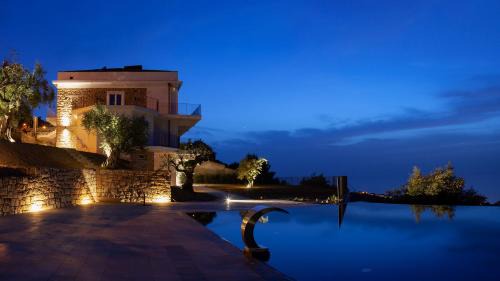 Naso Apartment | Experience Elegance at Maina Country Resort with Ocean Views