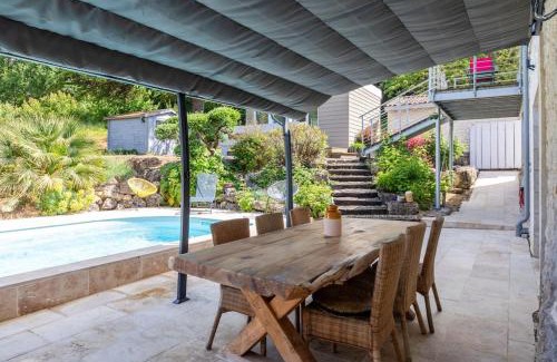Sainte-Colombe-en-Bruilhois House | Serene Maison de Campagne with Pool and Ocean Views