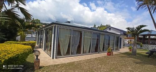 Trois-Bassins House | Serene Oceanfront Retreat for Families with a 9.2 Rating