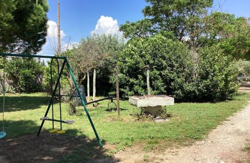 Saint-Nazaire-de-Pezan House | Garden Oasis: Family-Friendly Stay in Saint Nazaire de Pezan