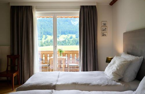 Chateau-d'Oex Hotel | Ermitage: Pet-Friendly Retreat with Hot Tub & Breakfast
