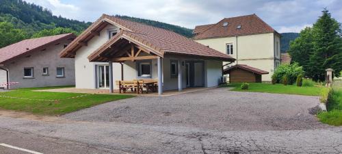 La Bresse House | Oceanfront Escape at Maison Gite Le Skieur - 4-Star Comfort