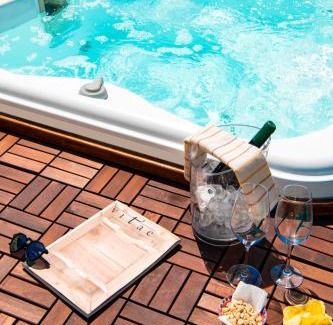 Nocelle Apartment | Oceanfront Maison Rosa: Guest Rated 8.9 with Hot Tub!