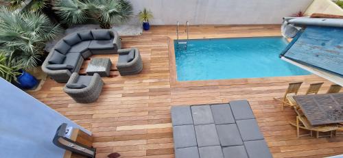 Quartier des Boucholeurs Apartment | Elegant Maison with Pool Steps from the Beach