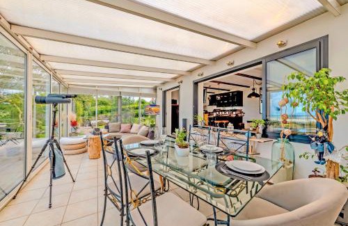 Plouider Villa | Coastal Retreat: Ocean View Home with Pool for Families