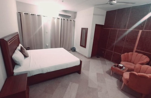 E-11 Sector House | Family-Friendly Lodges with Breakfast & Hot Tub Experience