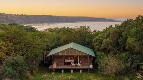 Makakatana Cabin | Idyllic Makakatana Bay Lodge: Oceanfront Bliss Awaits