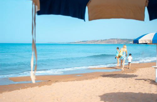 Sciacca Apartment | Idyllic Makauda Beach: Oceanfront Escape with Top Amenities