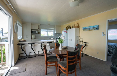 Maketu Cottage | Experience Maketu Sea Magic: Oceanfront Bach Retreat