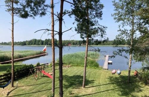 Szeligi Cabin | Scenic Makosieje Resort: Pet-Friendly Lakefront Retreat