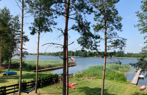 Szeligi Cabin | Scenic Makosieje Resort: Pet-Friendly Lakefront Retreat