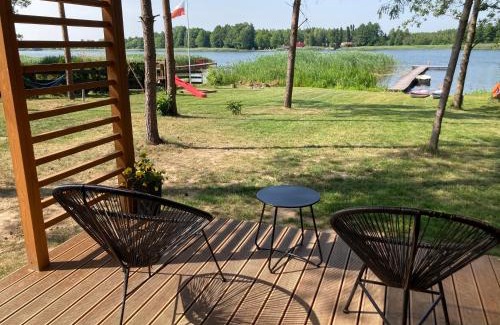 Szeligi Cabin | Scenic Makosieje Resort: Pet-Friendly Lakefront Retreat