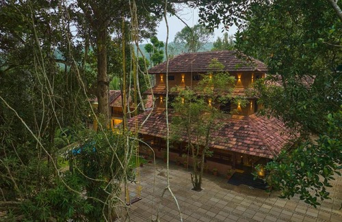 Tirur Resort | Malabar Kovilakam: Family-Friendly Retreat with Pool & Spa