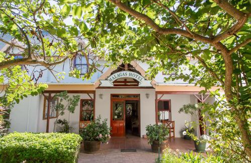 Malagas Hotel | Cozy Malagas Hotel with Pool & Breakfast for Every Family
