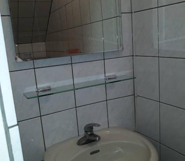 Budai House | Welcoming Malaya Guest House: Family-Friendly & Cozy Amenities