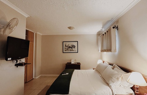 Harare East Bed & Breakfast | Malcolm Lodge: 4-Star Retreat with Pool & Family Amenities