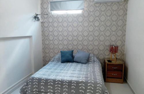 Ciudad Universitaria House | Budget-Friendly Malecon Rooms with Breakfast & Kitchen Access